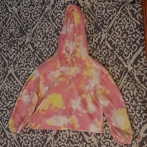 I am selling a medium size white yellow and pink stitch in Pine sweatshirt